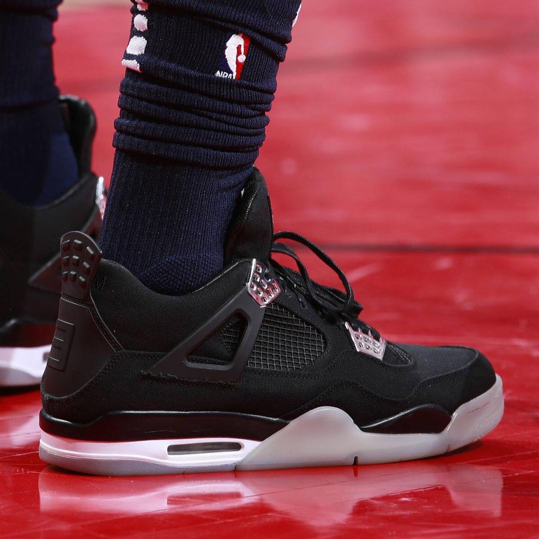 Eminem,Carhartt,Air Jordan 4  穿 20w 在脚上是怎样一种体验？巴特勒赛场上脚天价 AJ 联名